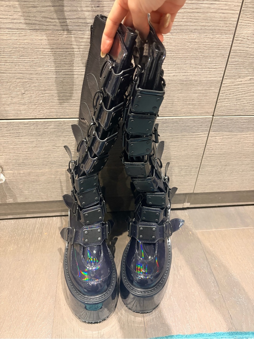 Demonia Black Holographic Lace-Up Platform Buckle Knee-High Boots